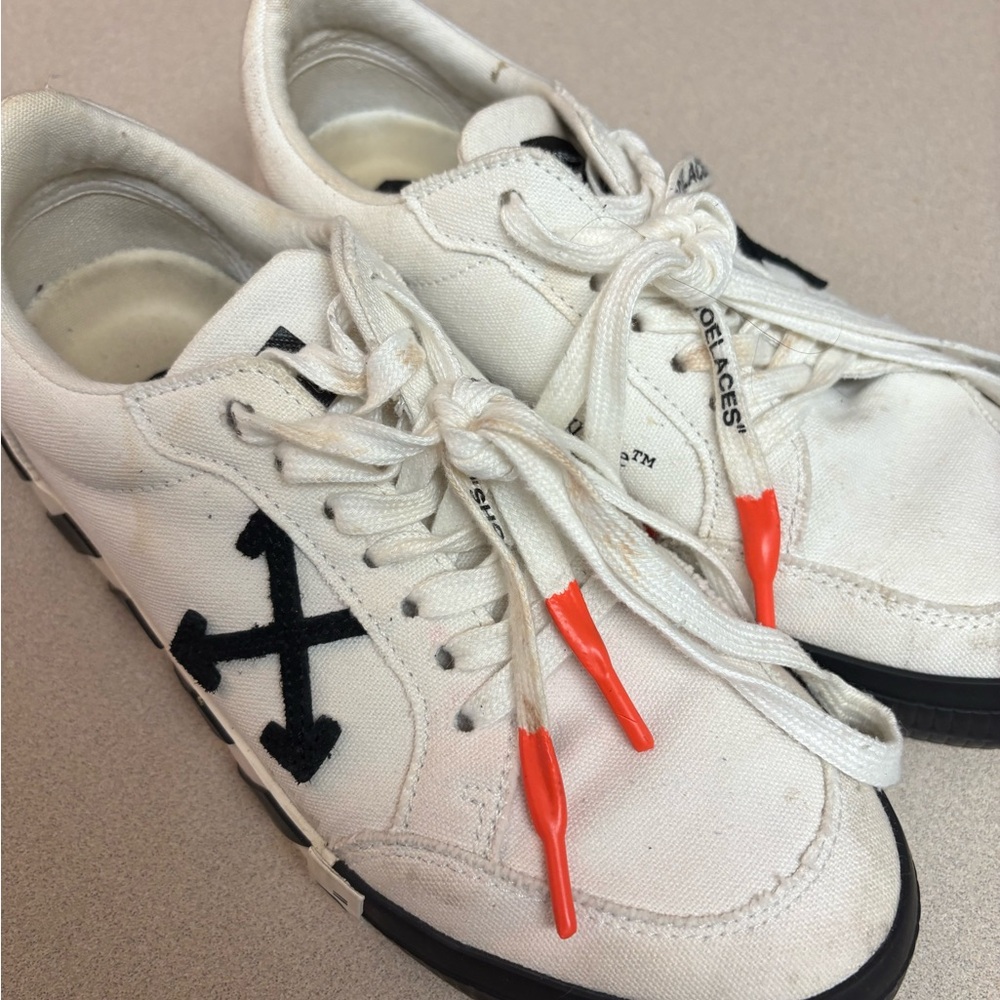 Off-White Canvas Sneakers with Black Arrow